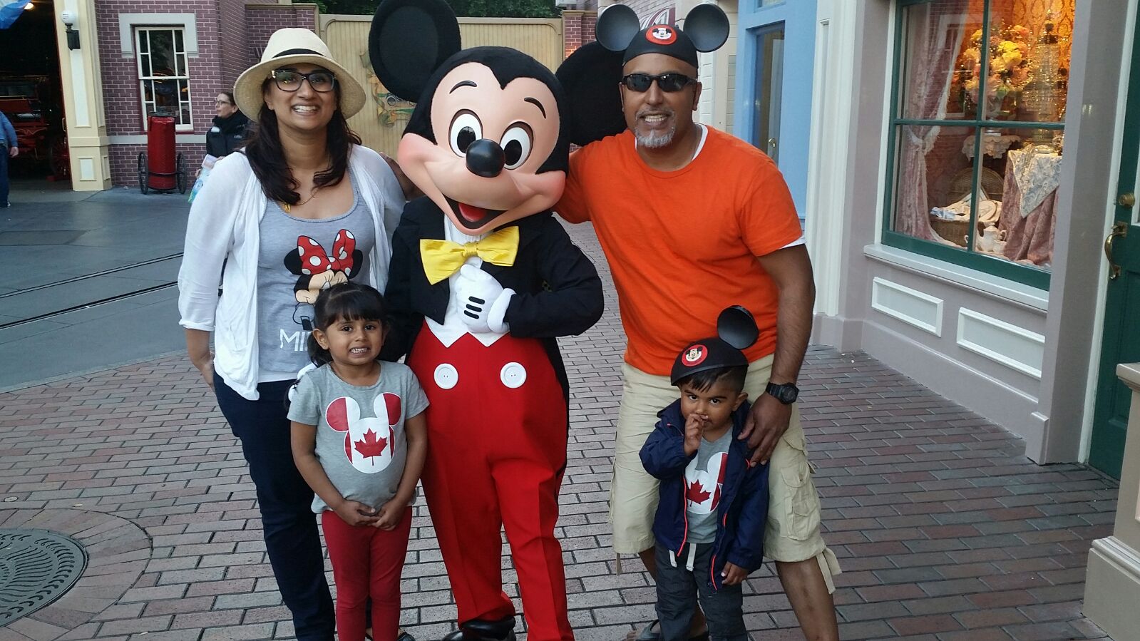 Sandy at Disney Land with her family