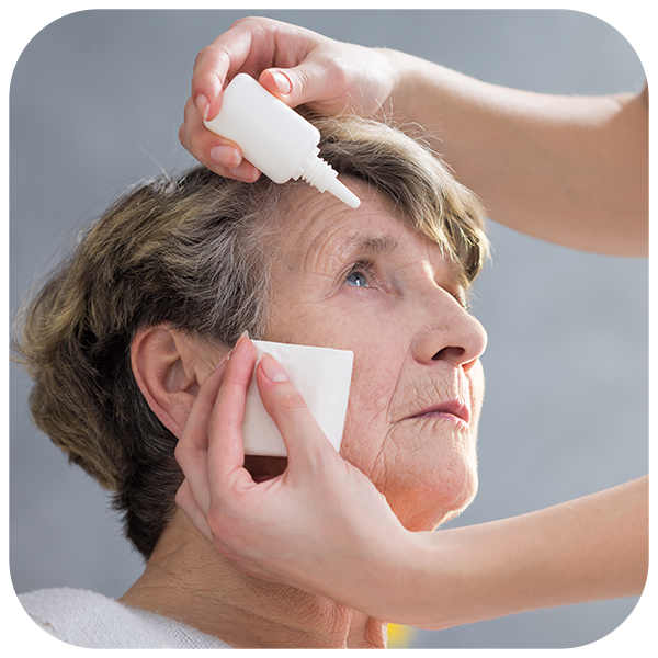 Patient getting treatment from optometrist