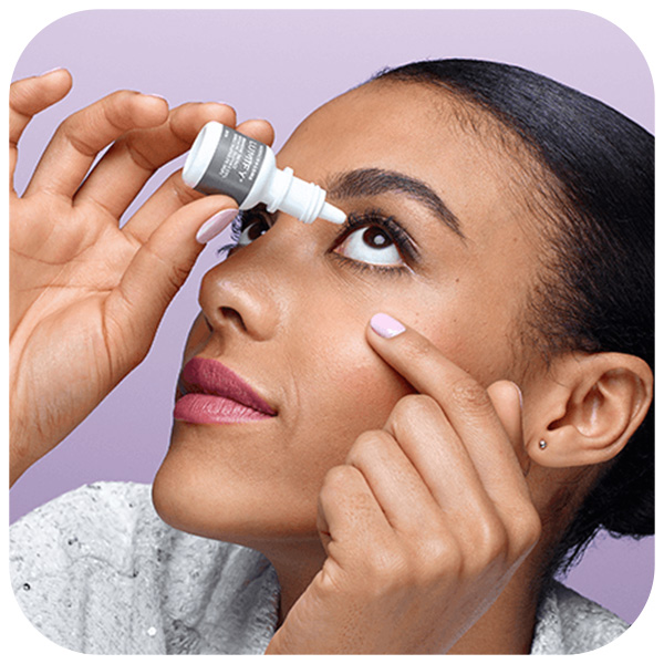 Woman using Lumify eye drop