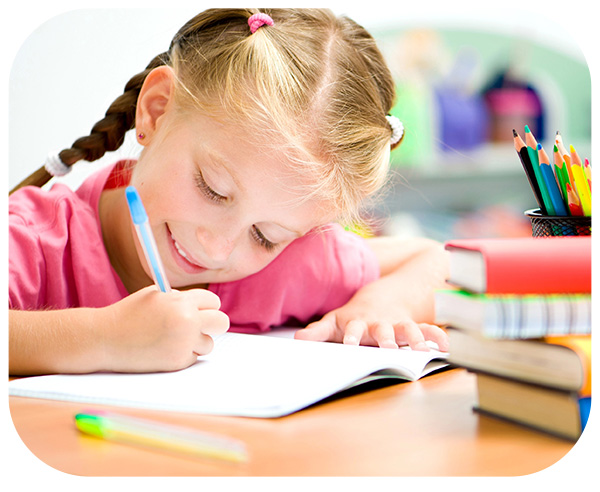 Girl writing on the book